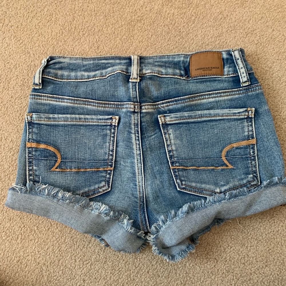 next level stretch jean shorts AE